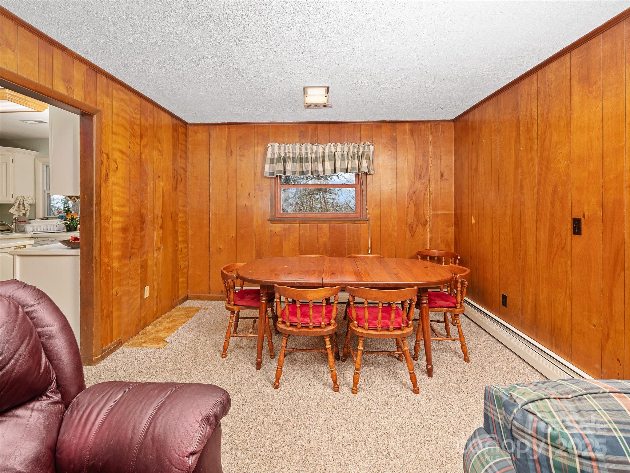 35 Smith Rdg Drive Asheville, NC 28803 - Photo 10 of 38 a dining room with furniture and a window
