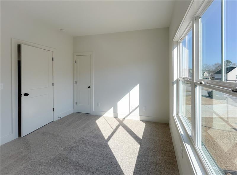 27 Bridgestone Way Cartersville, GA 30120 - Photo 21 of 31 a view of an entryway with wooden floor and door