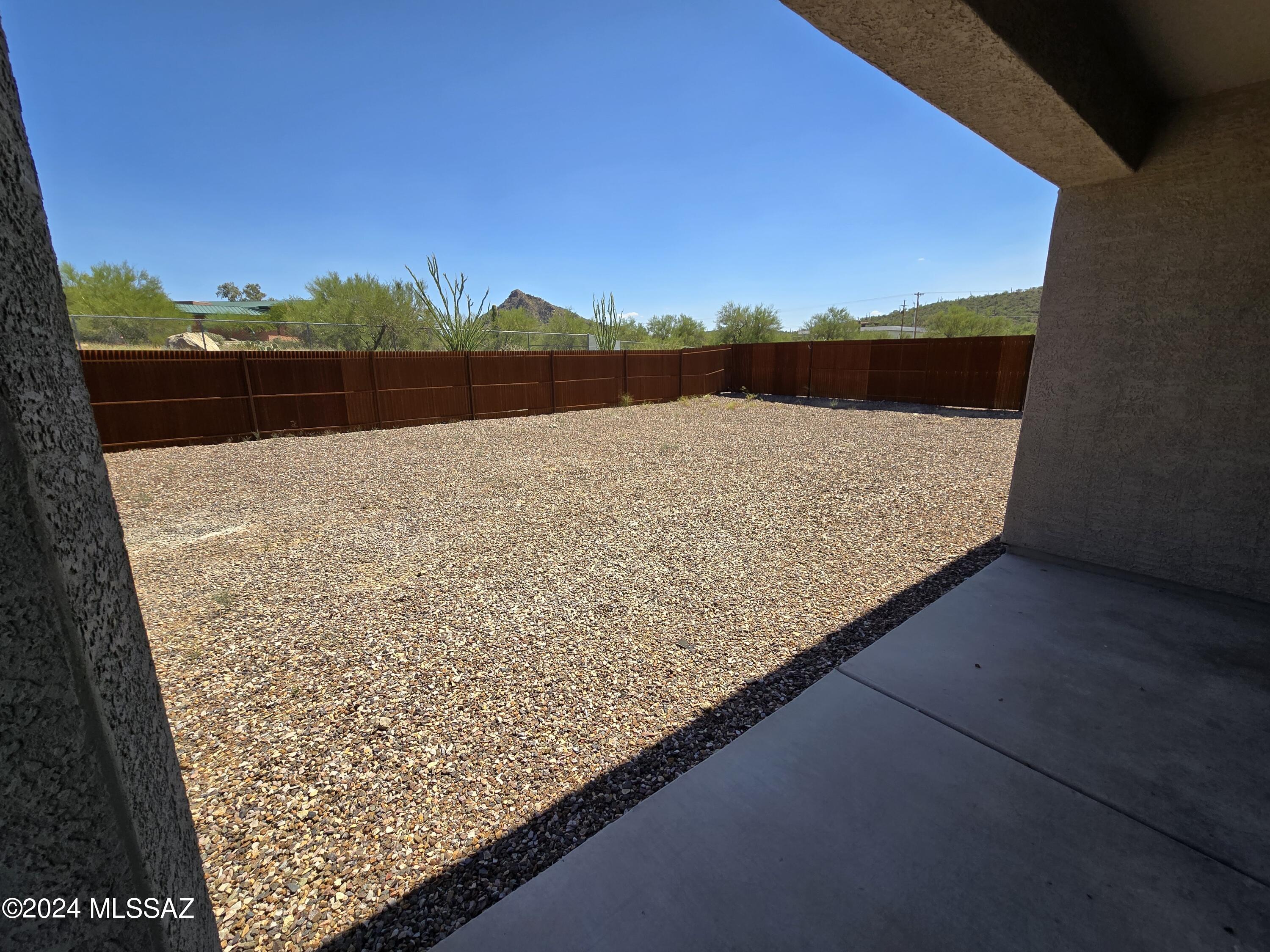 4877 South Avenida De Raspa Tucson, AZ 85746 - Photo 12 of 20 Gravel Backyard