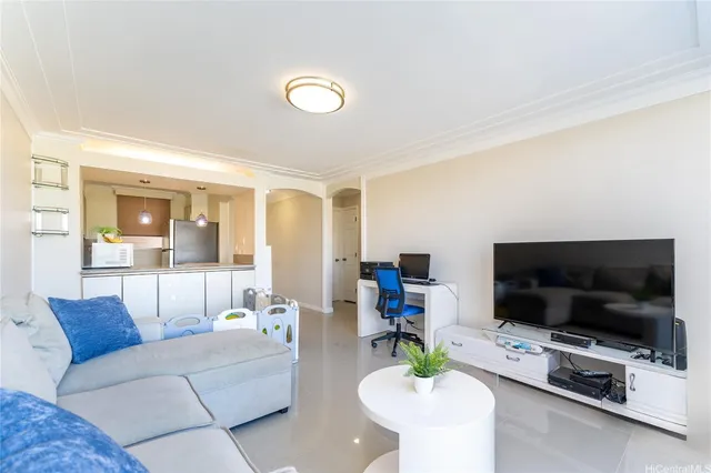 a living room with furniture and a flat screen tv