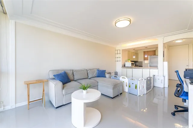 a living room with furniture and a table