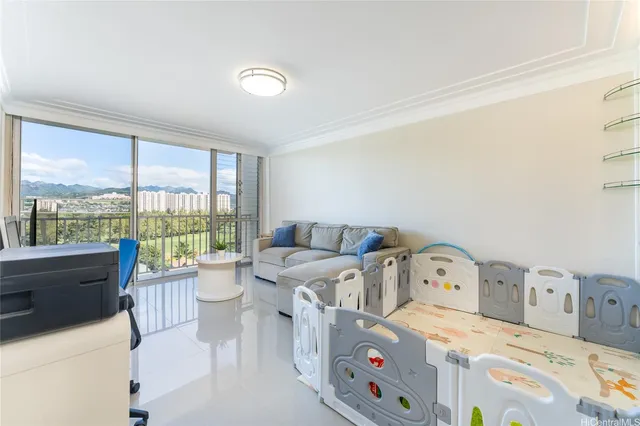 a room with furniture and a large window