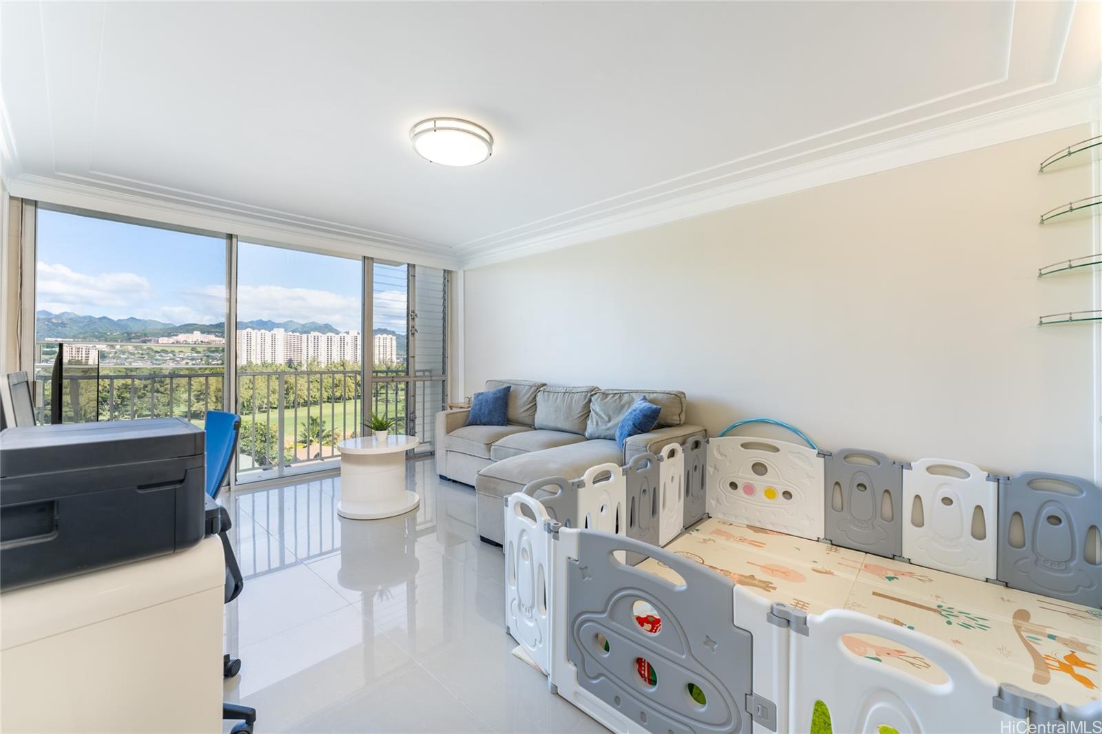 949 Ala Nanala Street, Unit 702 Honolulu, HI 96818 - Photo 4 of 23 a room with furniture and a large window