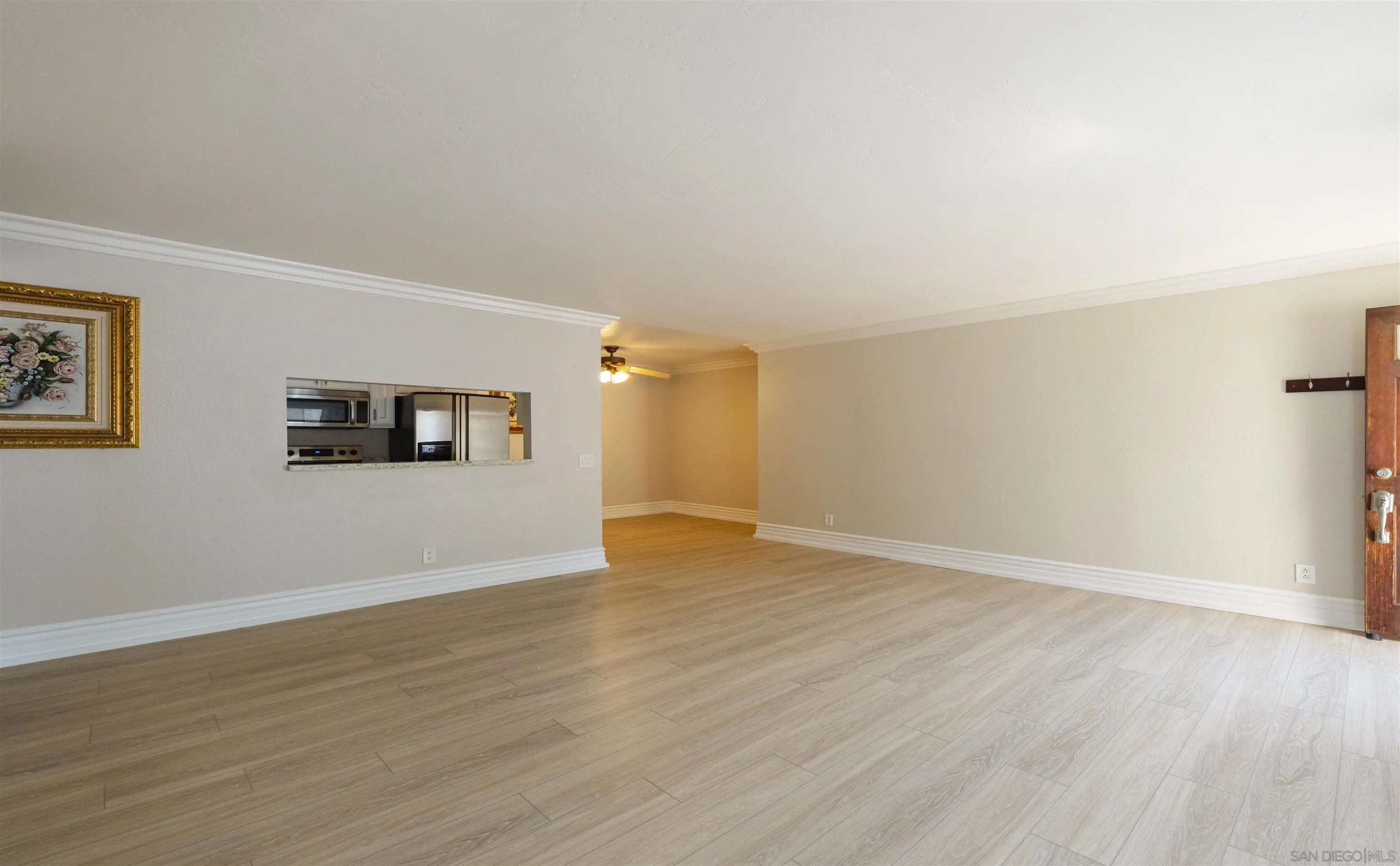 536 Telegraph Canyon Road, Unit E Chula Vista, CA 91910 - Photo 26 of 47 a view of empty room with wooden floor