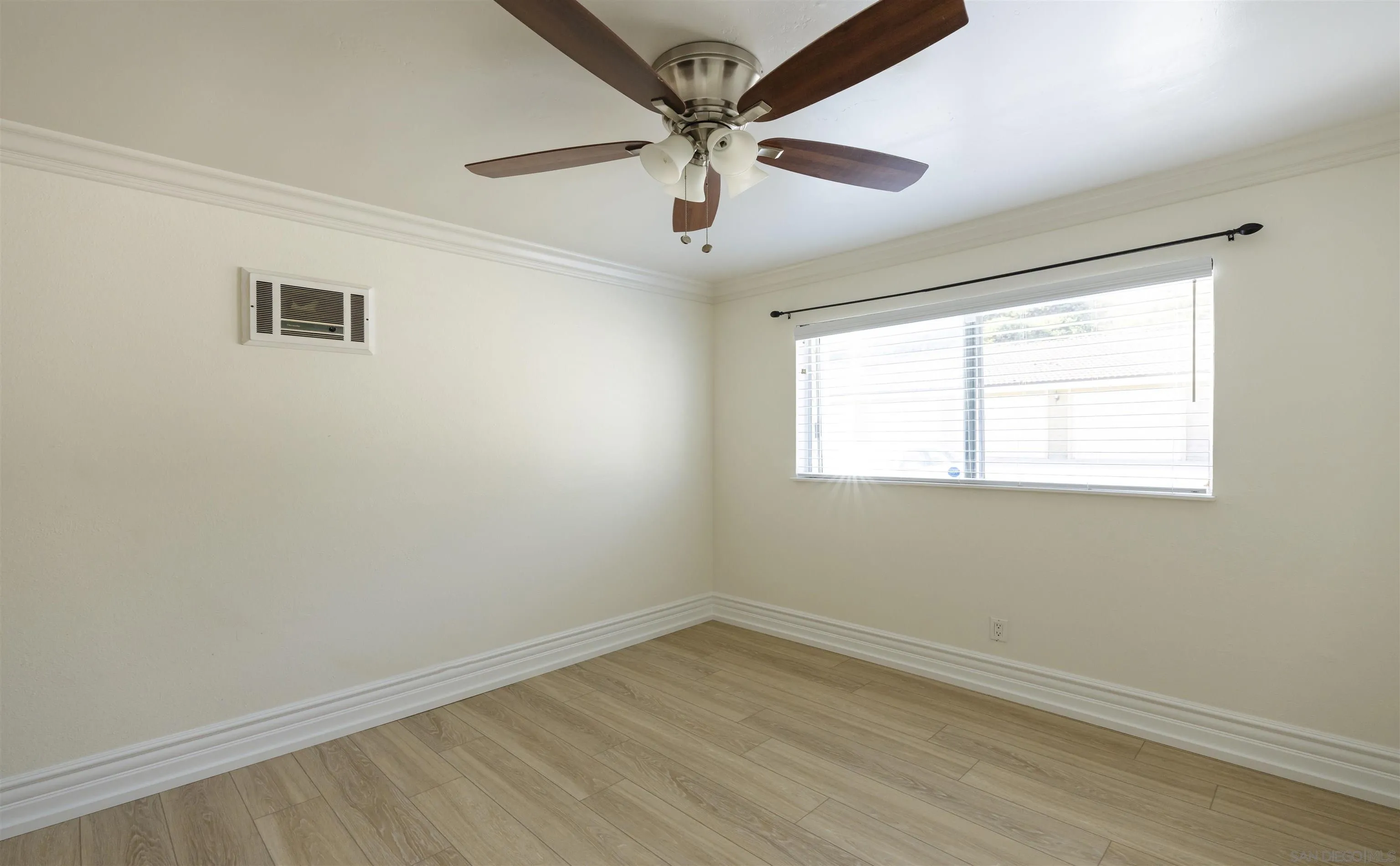 536 Telegraph Canyon Road, Unit E Chula Vista, CA 91910 - Photo 29 of 47 a view of empty room with wooden floor