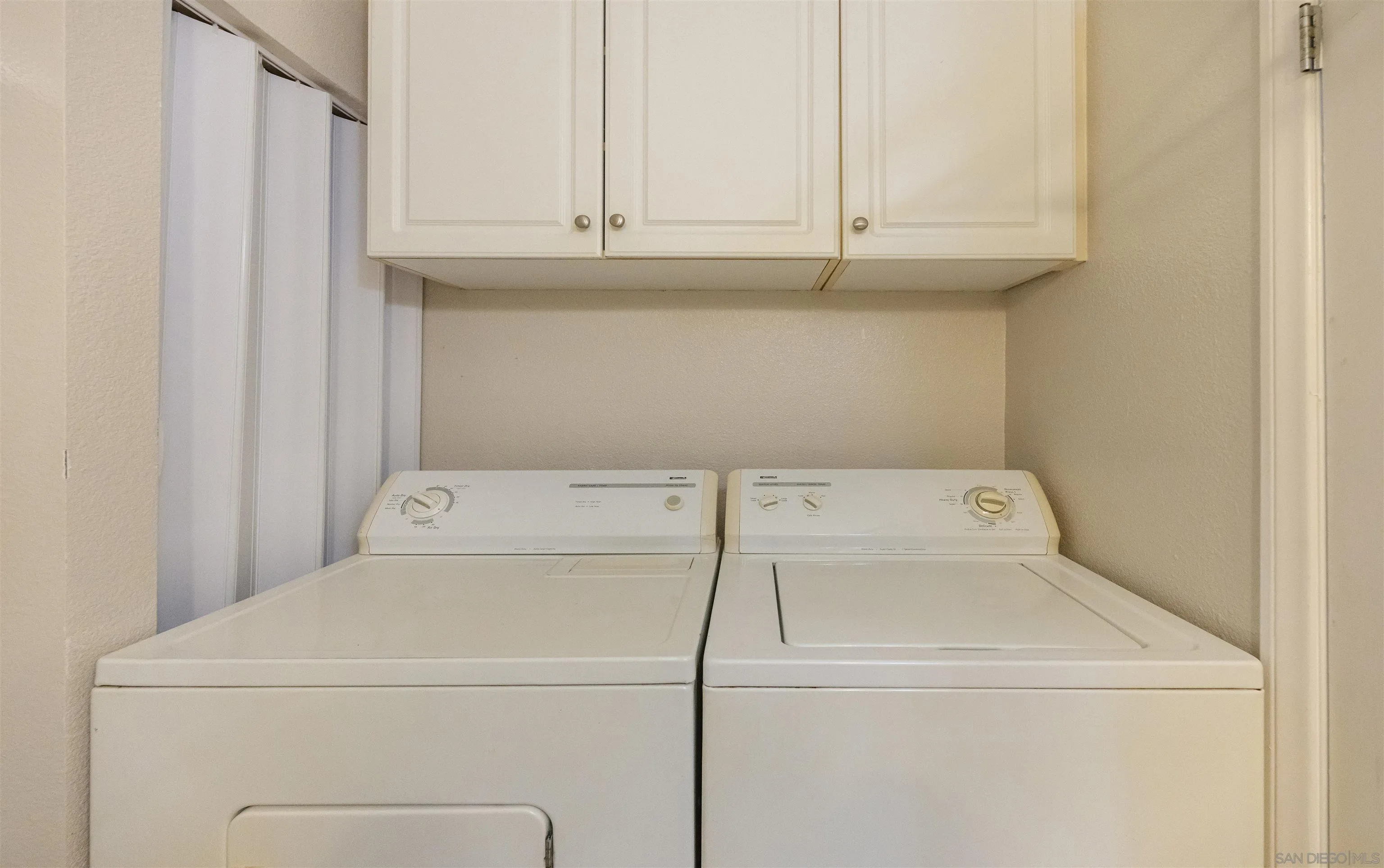 536 Telegraph Canyon Road, Unit E Chula Vista, CA 91910 - Photo 33 of 47 a utility room with dryer and washer
