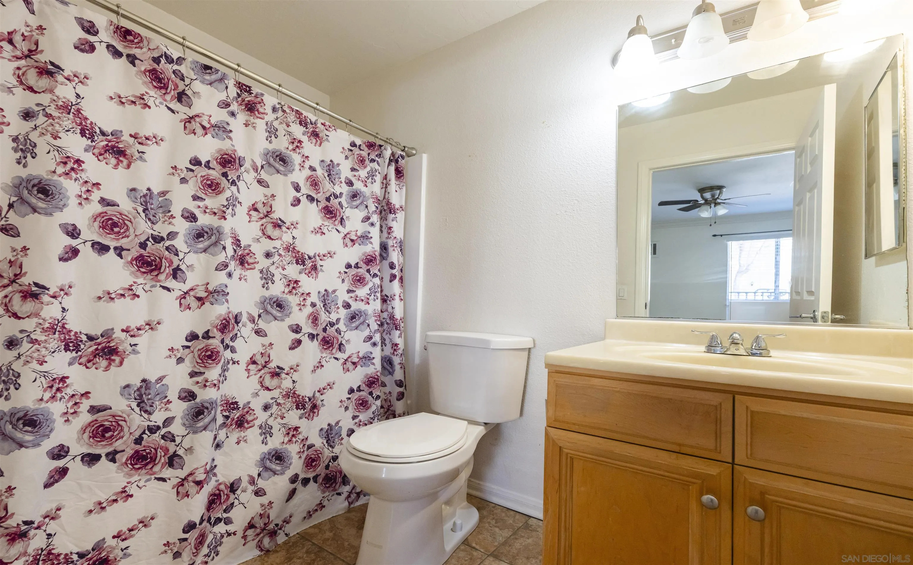 536 Telegraph Canyon Road, Unit E Chula Vista, CA 91910 - Photo 39 of 47 a bathroom with a sink toilet and shower