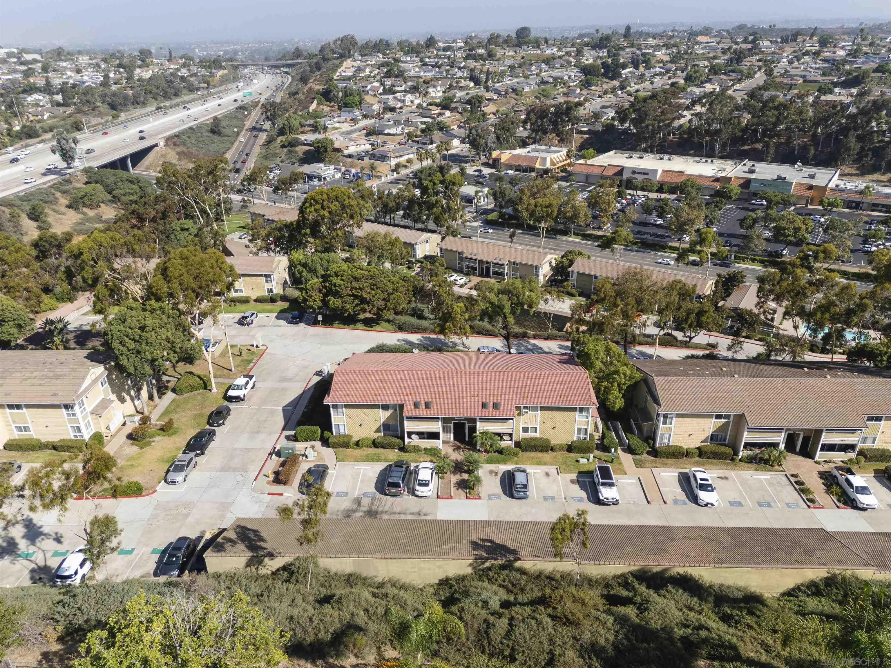 536 Telegraph Canyon Road, Unit E Chula Vista, CA 91910 - Photo 42 of 47 an aerial view of residential houses with outdoor space