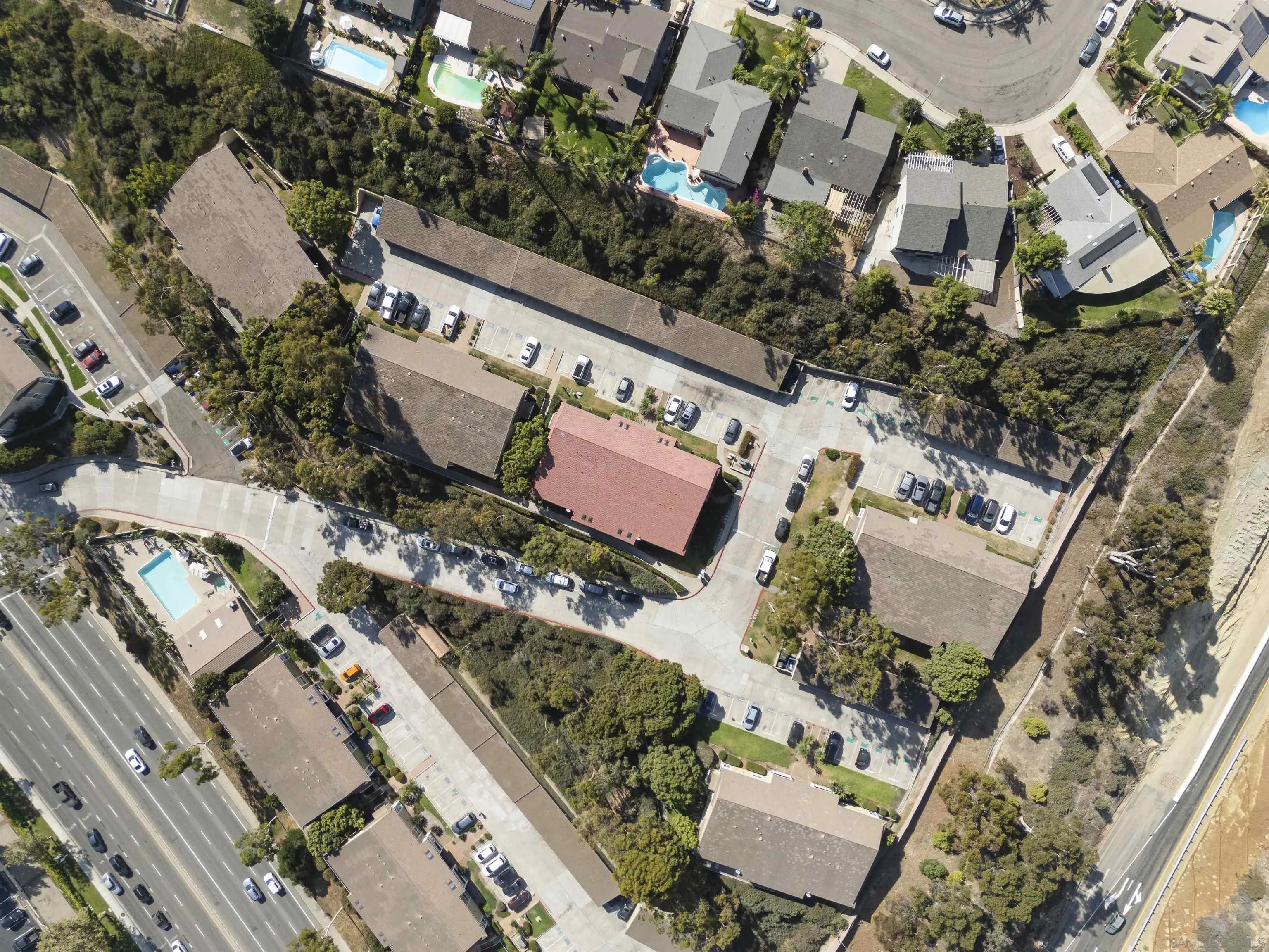 536 Telegraph Canyon Road, Unit E Chula Vista, CA 91910 - Photo 47 of 47 an aerial view of a house with a yard and lake view