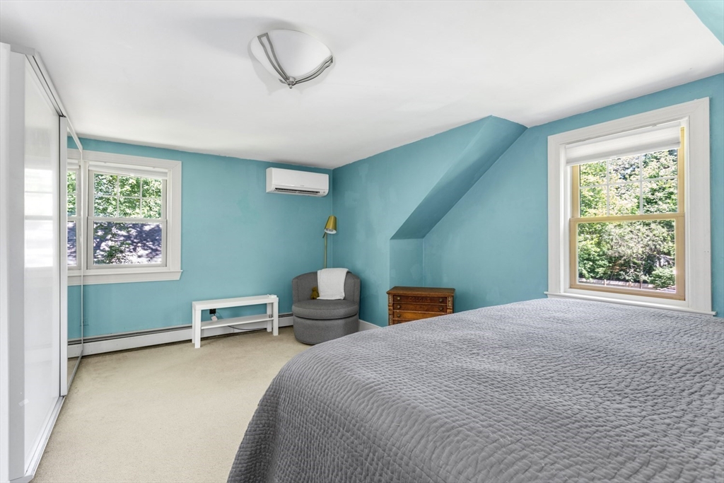 8 May Street Sharon, MA 02067 - Photo 20 of 39 a bedroom with a bed and a window