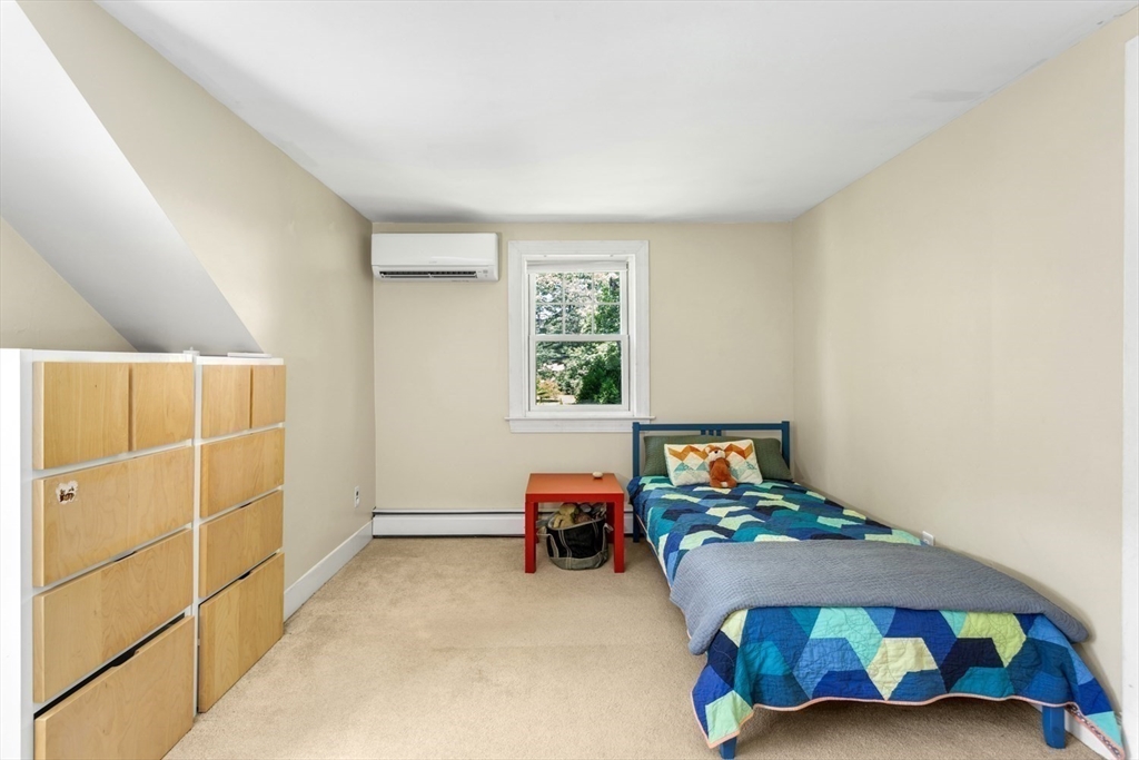 8 May Street Sharon, MA 02067 - Photo 25 of 39 a bedroom with a bed and window