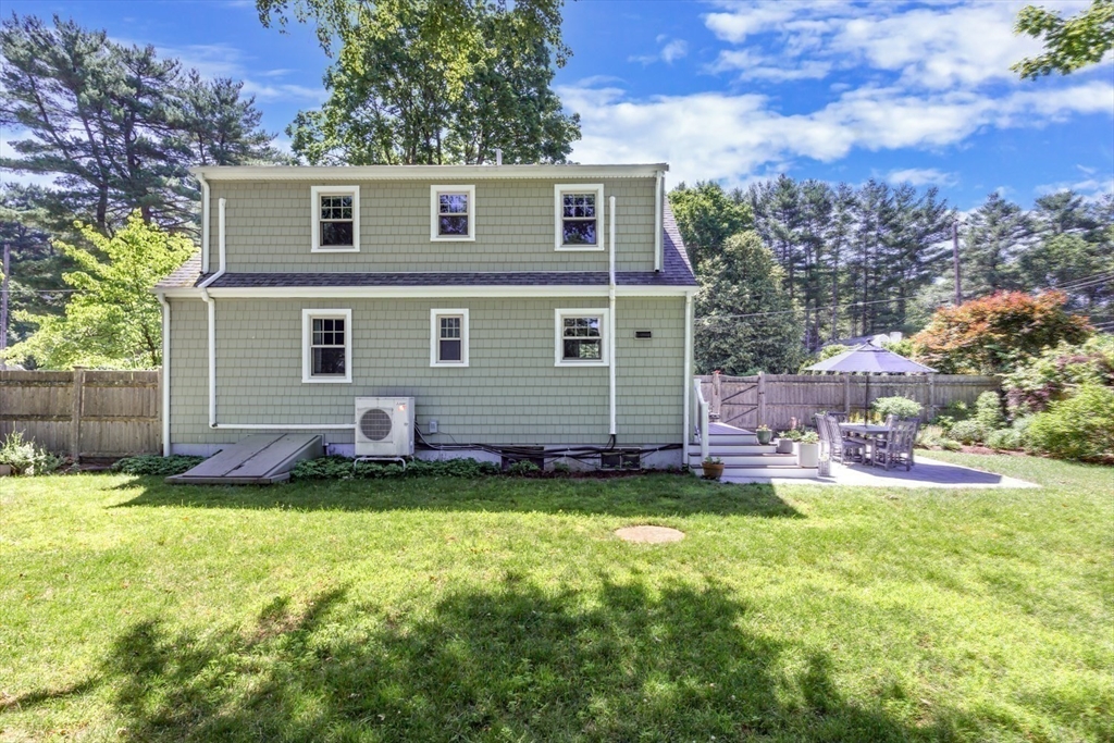 8 May Street Sharon, MA 02067 - Photo 30 of 39 a view of a house with a yard and sitting area