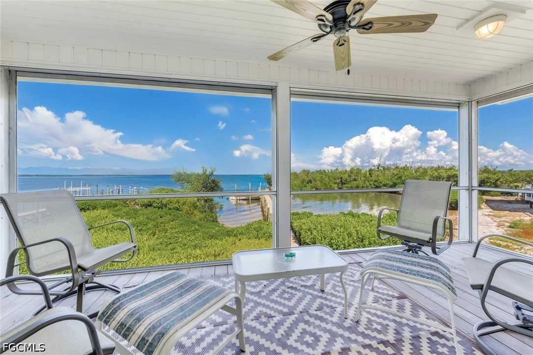 303 Useppa Useppa Island, Unit A Bokeelia, FL 33922 - Photo 34 of 50 a view of a livingroom with furniture