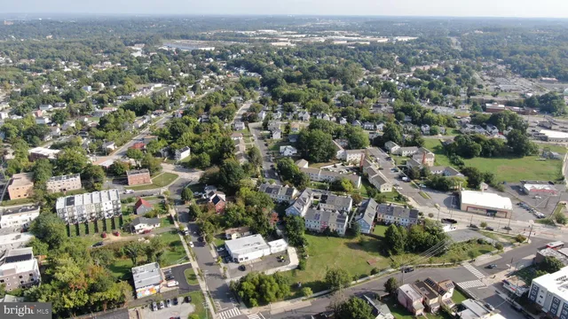 an aerial view of a city with lots of residential buildings