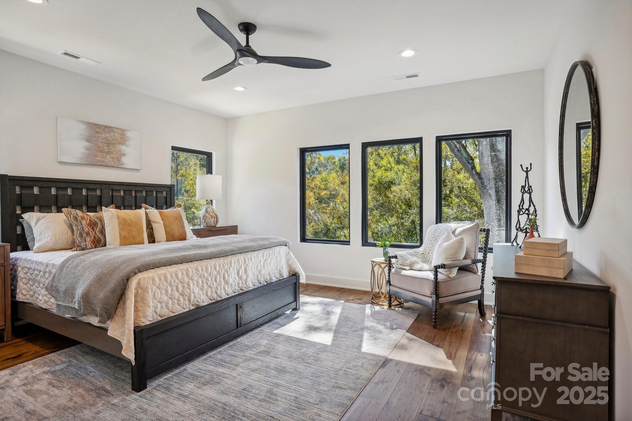 5610 Farmbrook Drive Charlotte, NC 28210 - Photo 20 of 45 a bed room with a bed and a large window