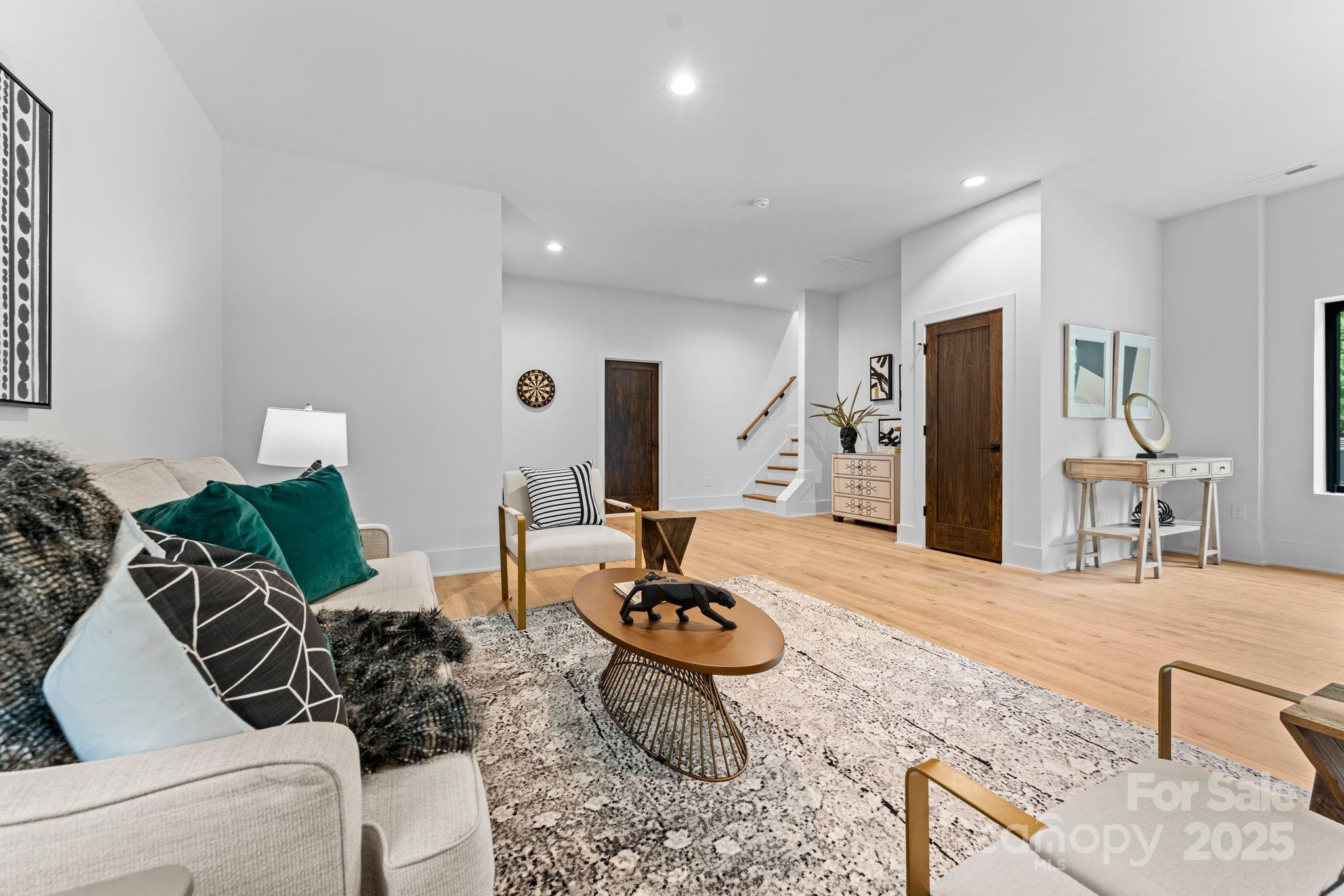 5610 Farmbrook Drive Charlotte, NC 28210 - Photo 35 of 45 a living room with furniture and a table