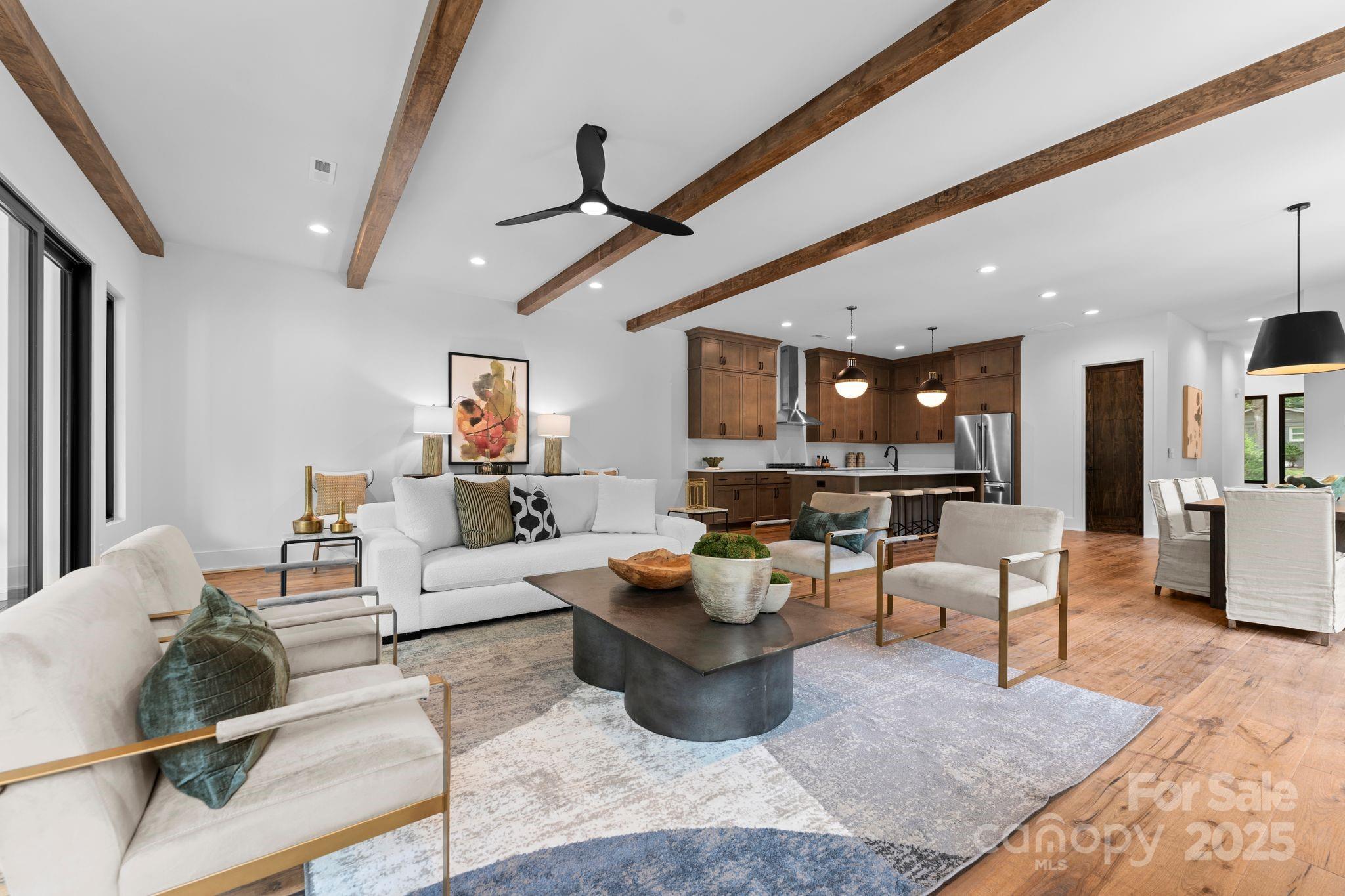 5610 Farmbrook Drive Charlotte, NC 28210 - Photo 4 of 45 a living room with furniture and kitchen view