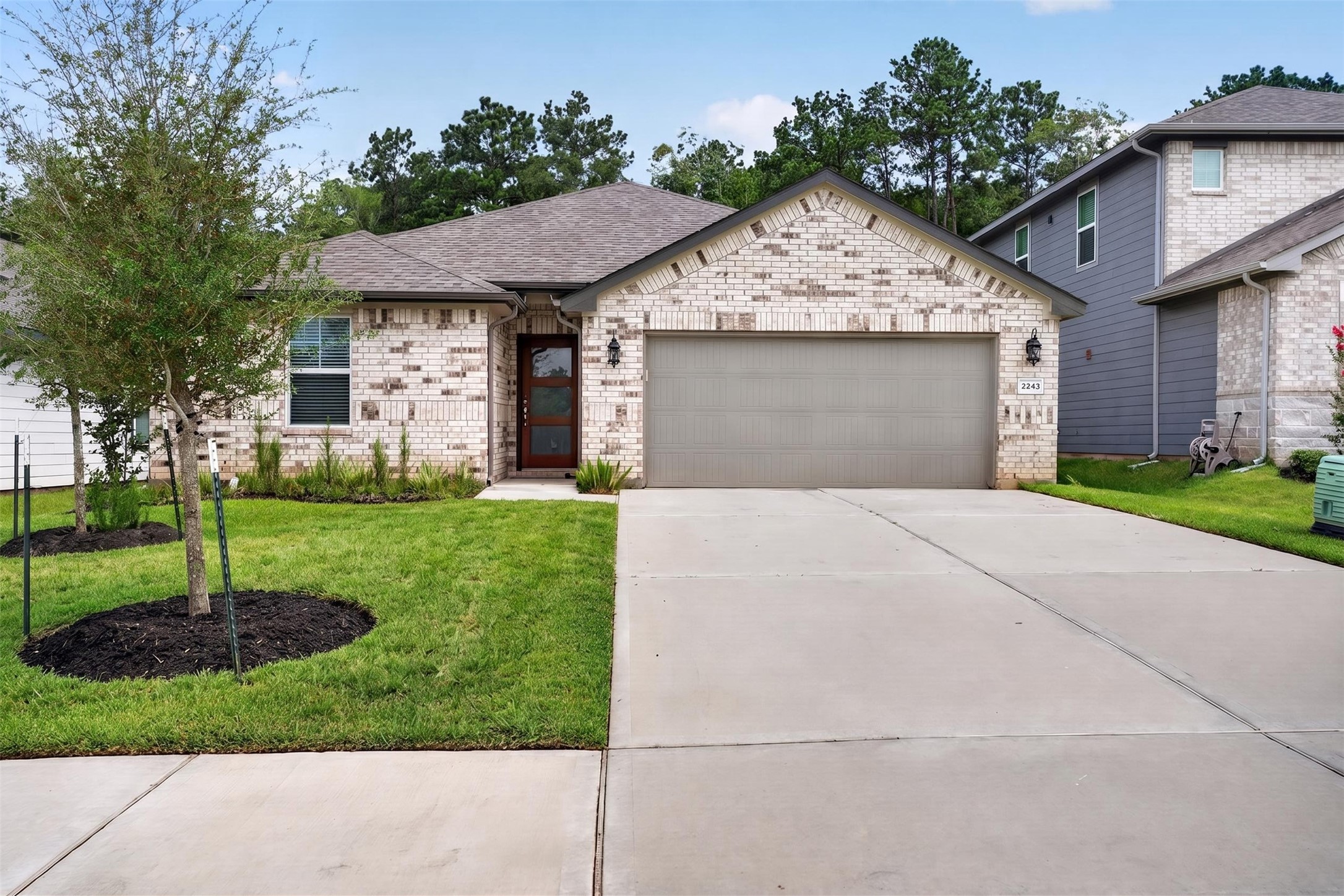 2243 O Conner Rnch Way Conroe, TX 77301 - Photo 2 of 42 Front of home