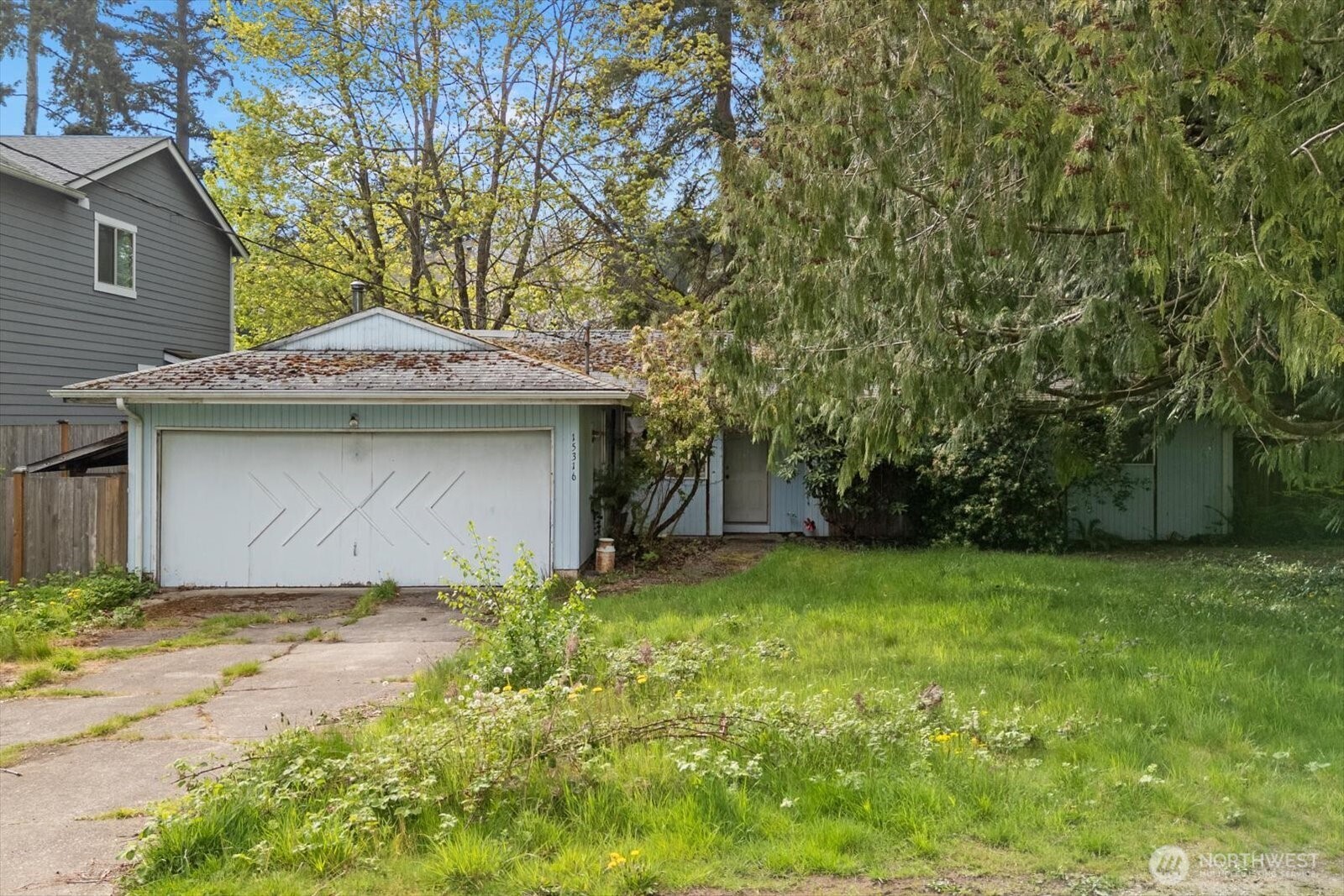 15316 50th Place West Edmonds, WA 98026 - Photo 1 of 12 a front view of a house with a yard