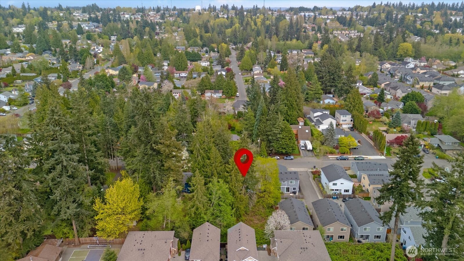 15316 50th Place West Edmonds, WA 98026 - Photo 8 of 12 an aerial view of residential houses with outdoor space and trees