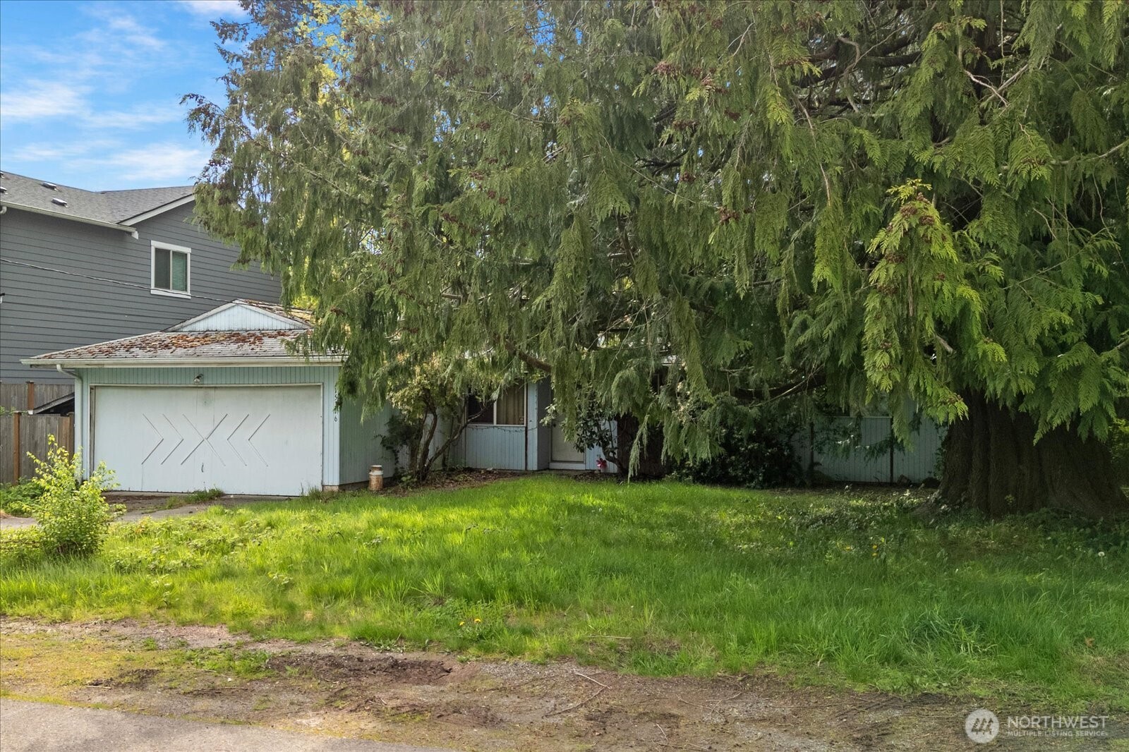 15316 50th Place West Edmonds, WA 98026 - Photo 9 of 12 a view of a house with a yard
