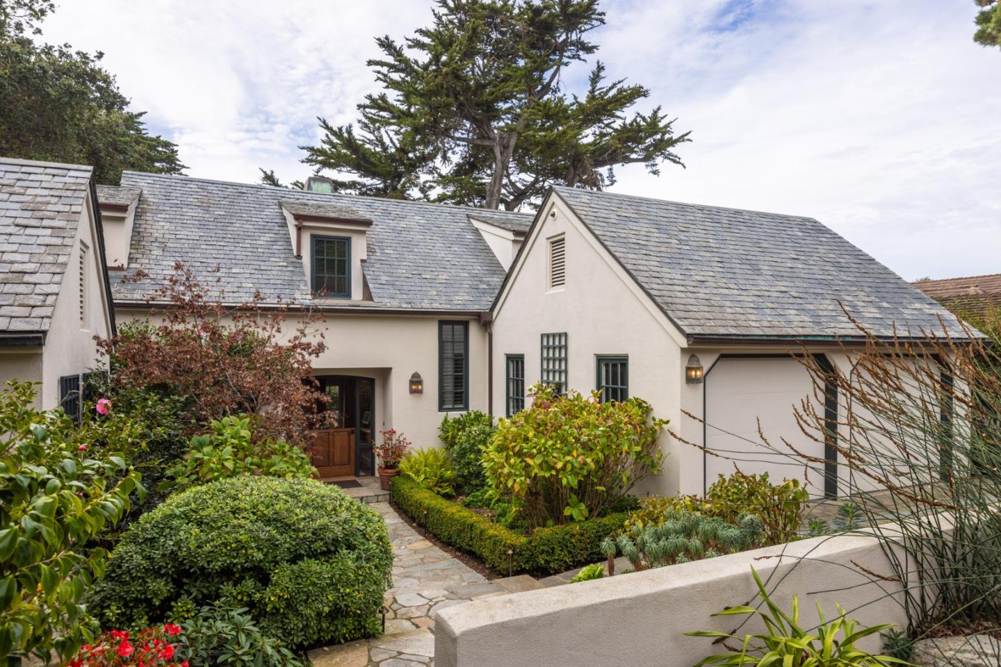 0 Northwest Nw Corner Carmel, CA 93923 - Photo 3 of 13 a view of a house with brick walls and potted plants