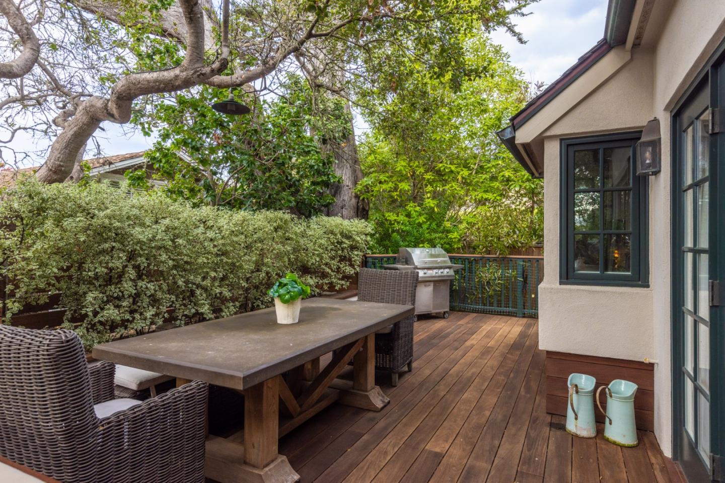 0 Northwest Nw Corner Carmel, CA 93923 - Photo 6 of 13 a view of a patio with table and chairs with wooden floor and fence