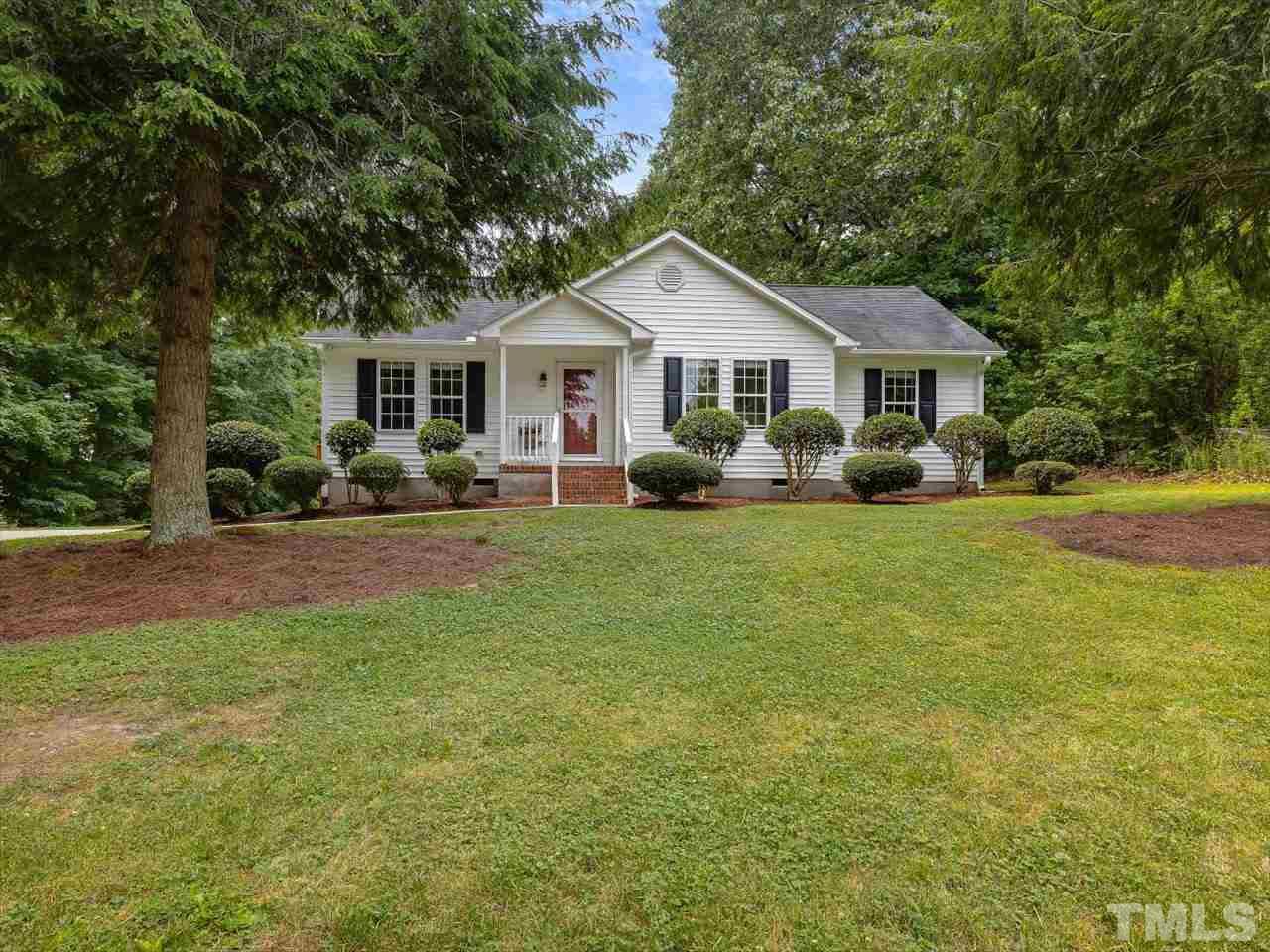 6441 Guess Road Durham, NC 27712 - Photo 1 of 30 a front view of a house with yard and green space