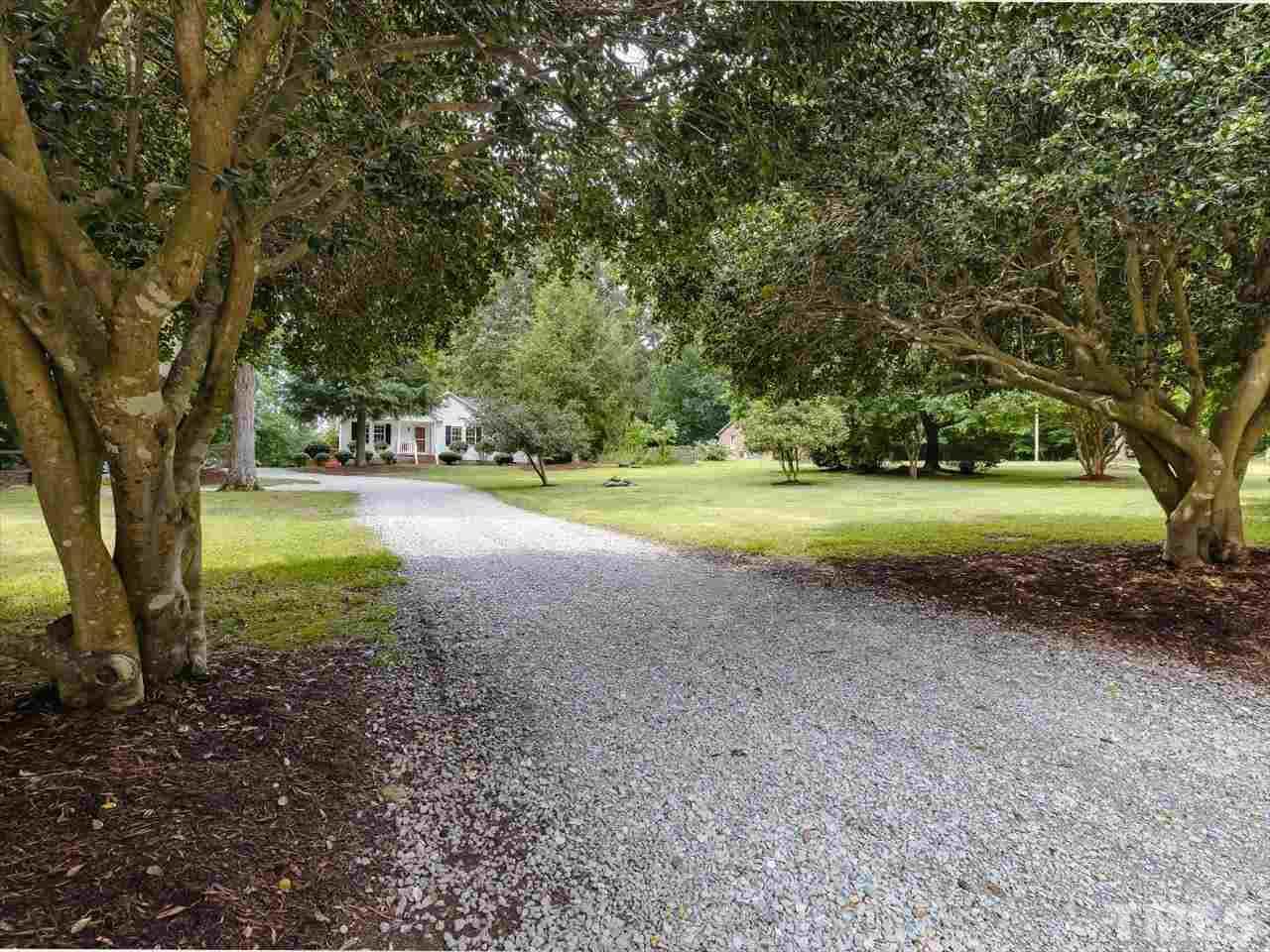 6441 Guess Road Durham, NC 27712 - Photo 2 of 30 a view of a big yard with large trees