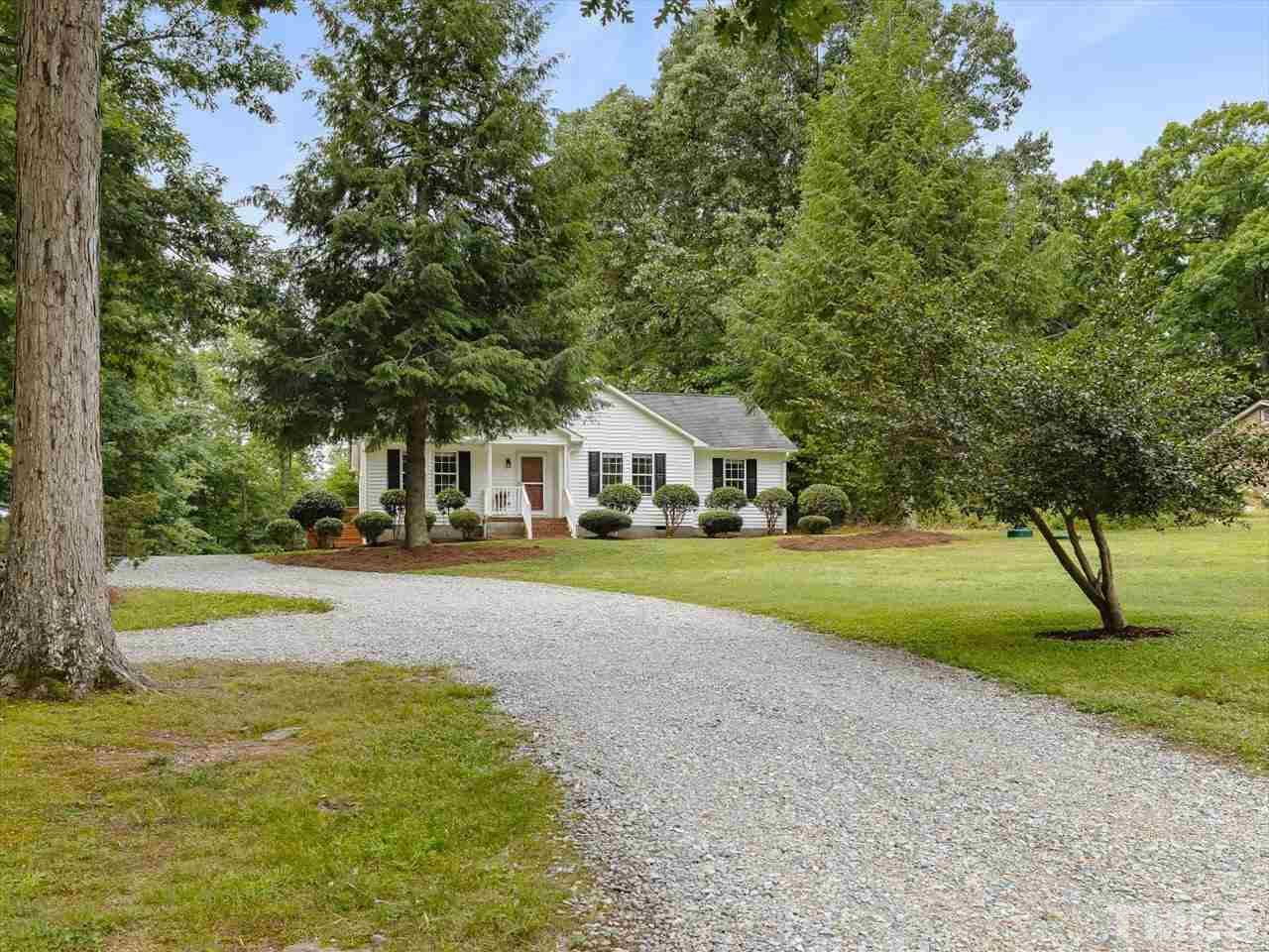 6441 Guess Road Durham, NC 27712 - Photo 3 of 30 a front view of house with yard and green space