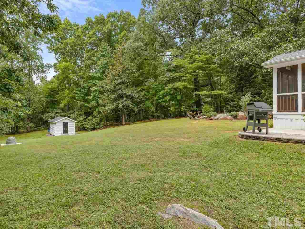 6441 Guess Road Durham, NC 27712 - Photo 24 of 30 a view of a garden with a house
