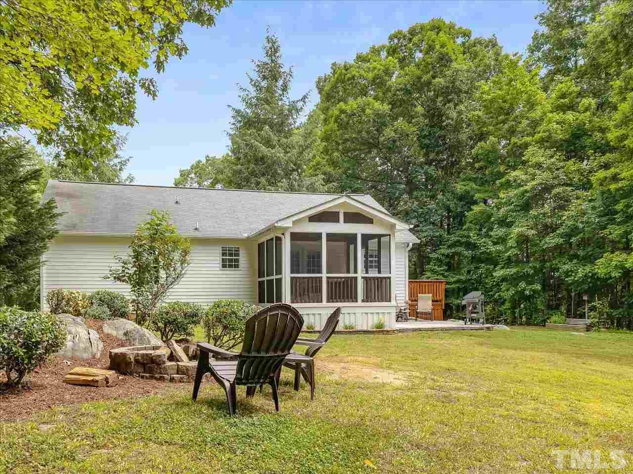 6441 Guess Road Durham, NC 27712 - Photo 25 of 30 a view of a house with pool and chairs