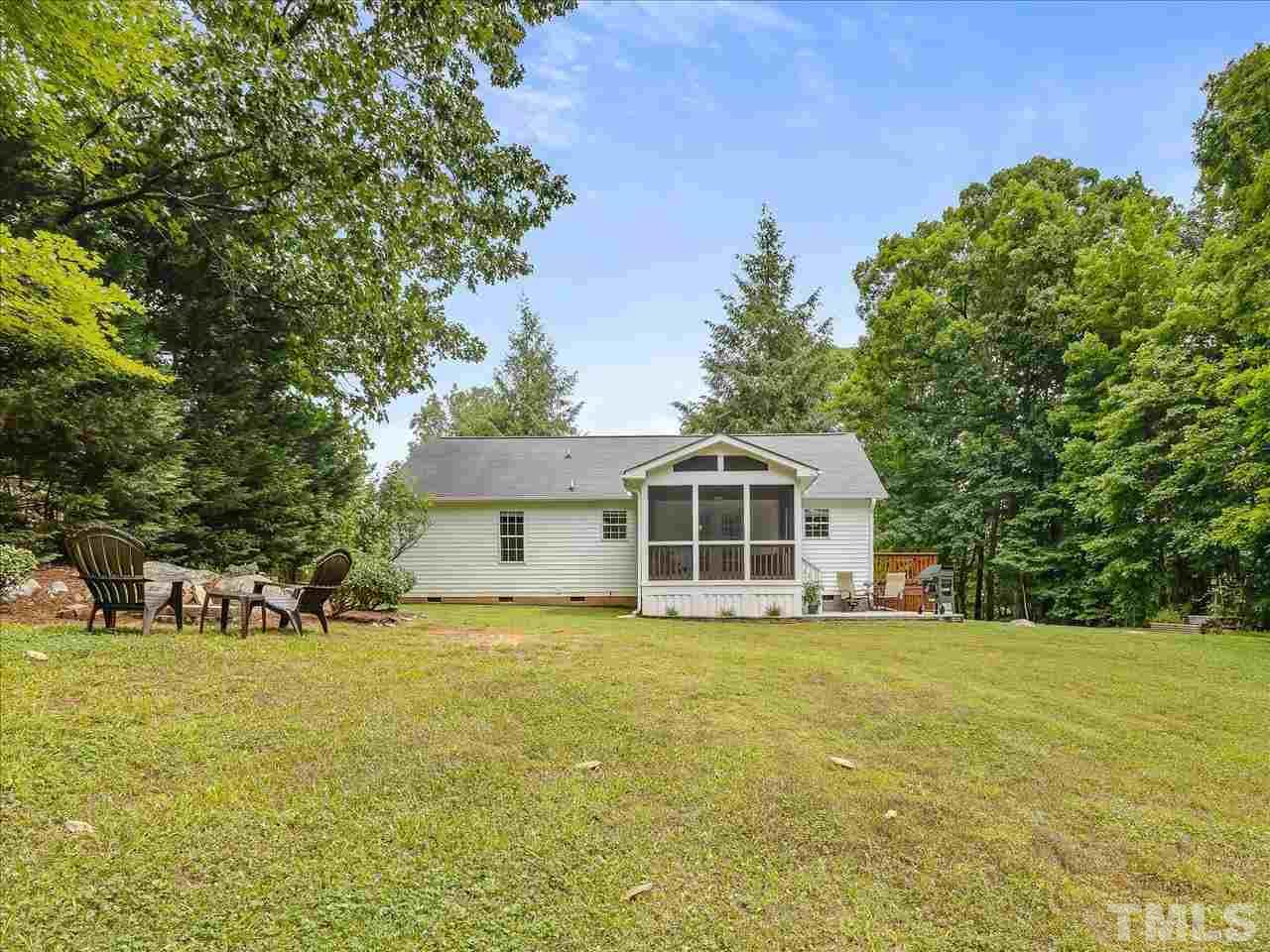 6441 Guess Road Durham, NC 27712 - Photo 27 of 30 a view of a house with a yard