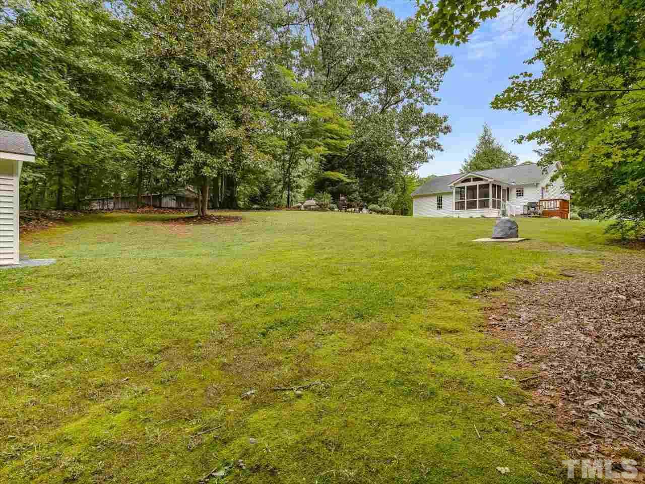 6441 Guess Road Durham, NC 27712 - Photo 28 of 30 a front view of a house with a yard
