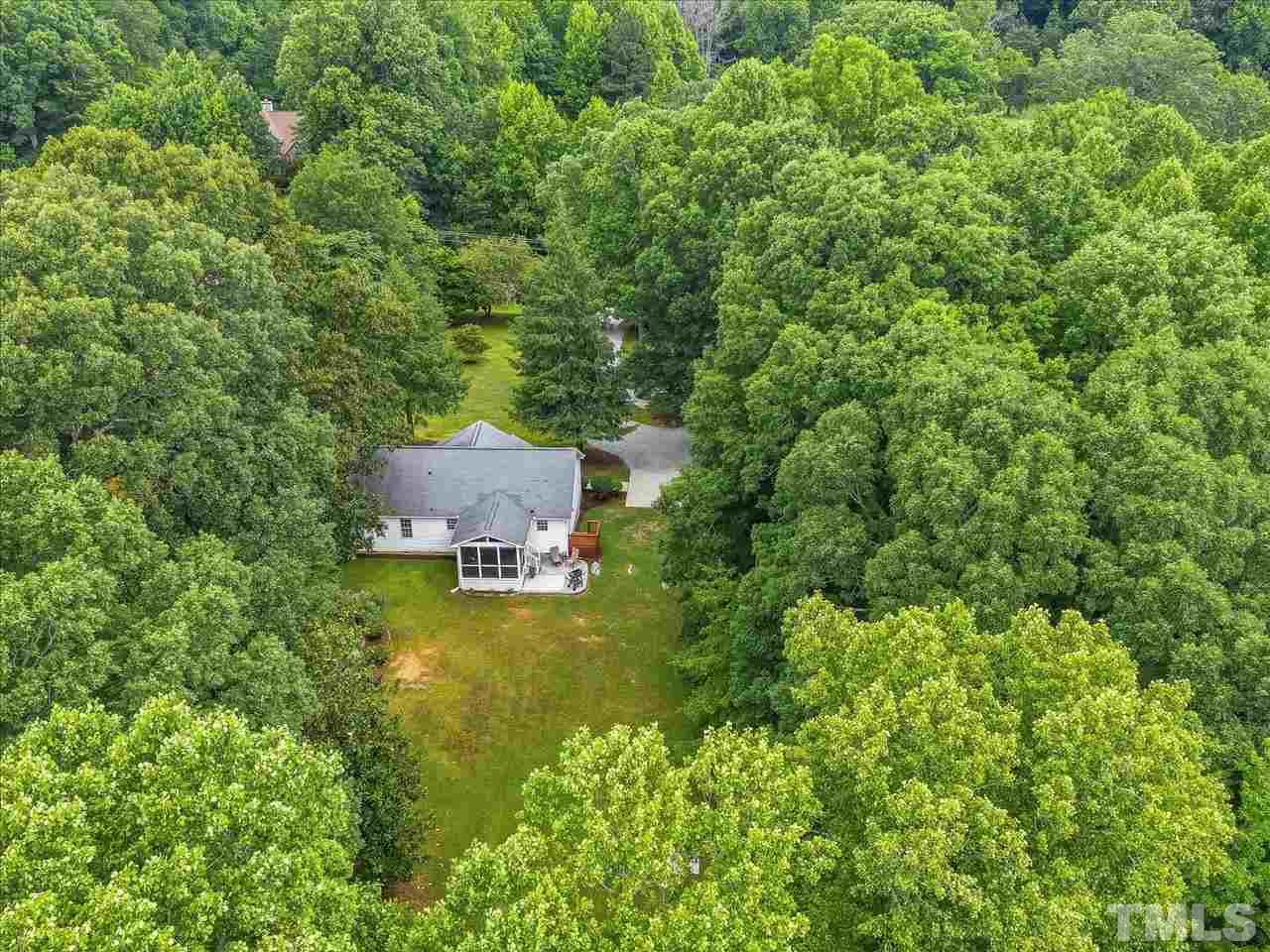 6441 Guess Road Durham, NC 27712 - Photo 29 of 30 an aerial view of residential house with outdoor space and trees all around