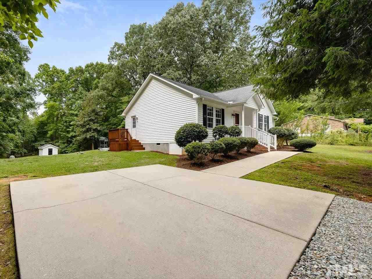 6441 Guess Road Durham, NC 27712 - Photo 5 of 30 a view of outdoor space yard and garage