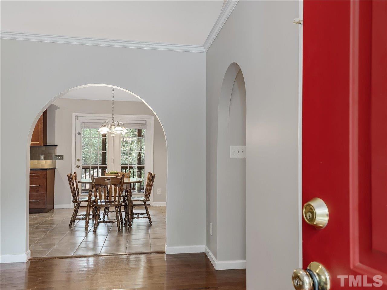 6441 Guess Road Durham, NC 27712 - Photo 6 of 30 a view of a dining room with furniture and wooden floor