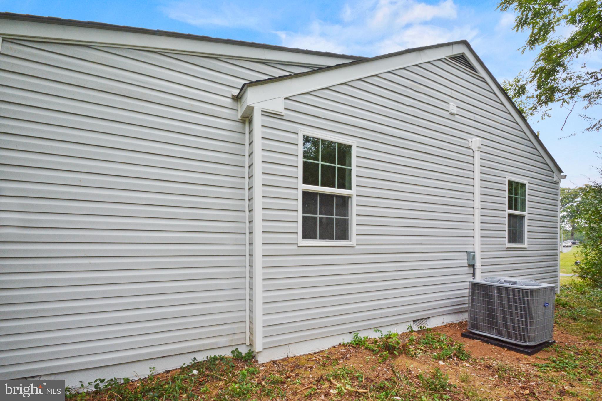 18084 Monrovia Road Orange, VA 22960 - Photo 27 of 28 a view of a white house with a small space