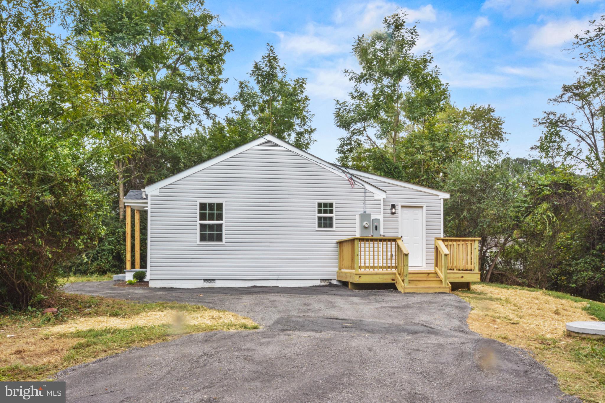 18084 Monrovia Road Orange, VA 22960 - Photo 5 of 28 a view of a house with a yard and large tree