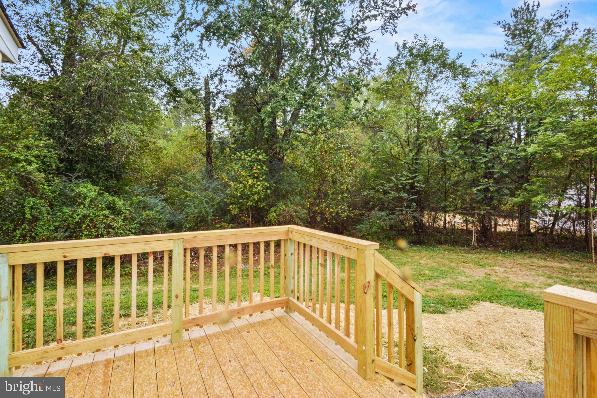 18084 Monrovia Road Orange, VA 22960 - Photo 7 of 28 a view of a house with backyard and deck