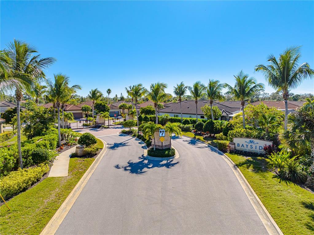 3929 Waypoint Avenue Osprey, FL 34229 - Photo 31 of 56 a swimming pool with outdoor seating and plants