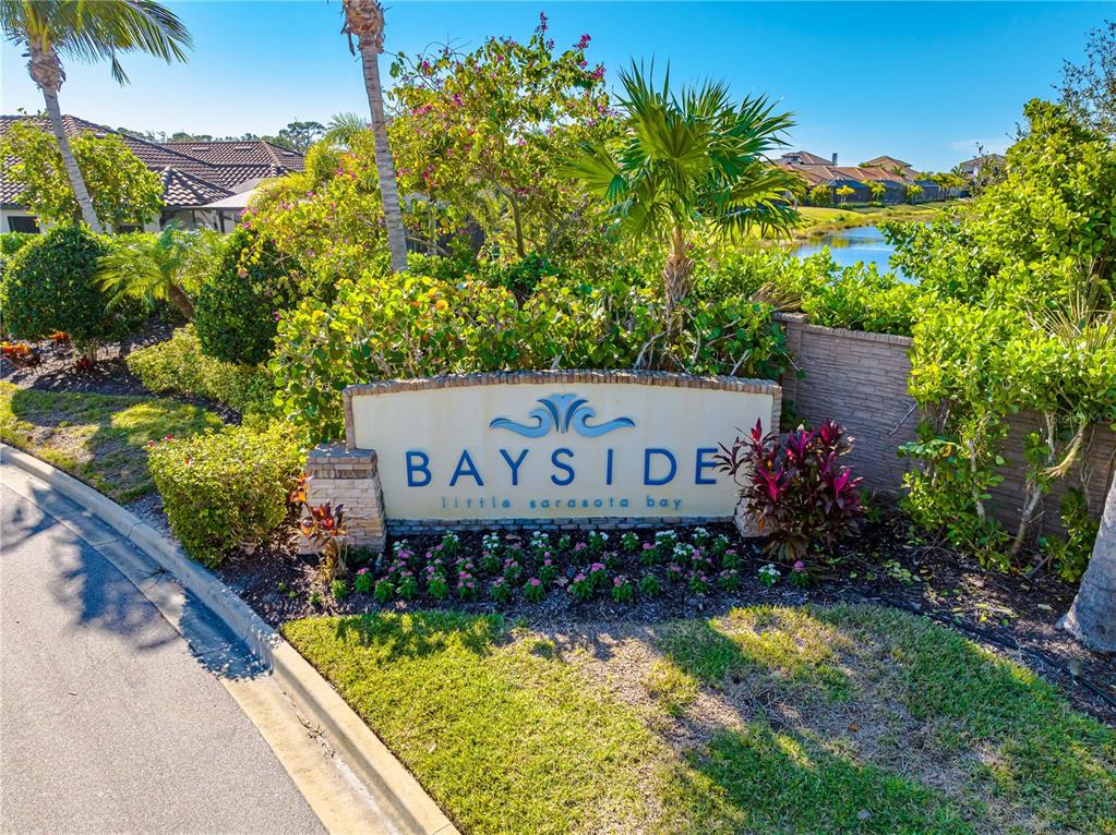 3929 Waypoint Avenue Osprey, FL 34229 - Photo 32 of 56 a view of swimming pool with a garden