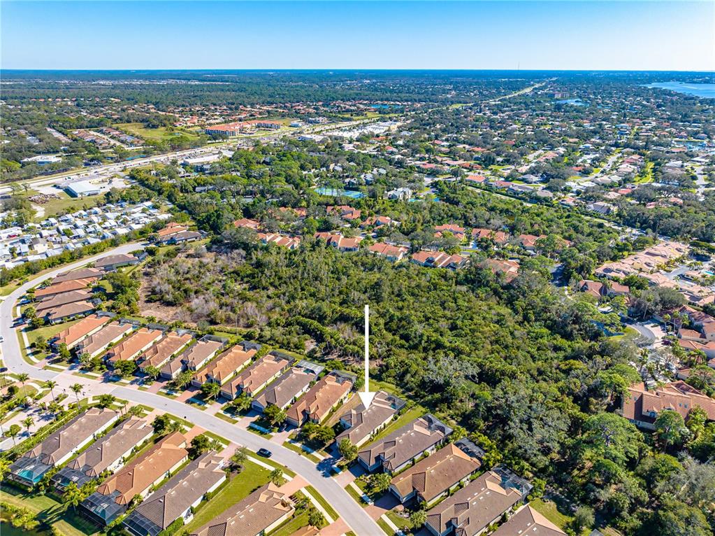 3929 Waypoint Avenue Osprey, FL 34229 - Photo 40 of 56 an aerial view of residential houses with outdoor space