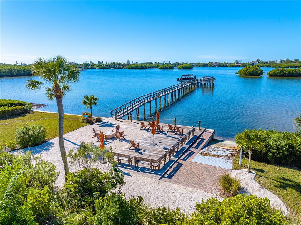 3929 Waypoint Avenue Osprey, FL 34229 - Photo 43 of 56 a view of a terrace with outdoor space