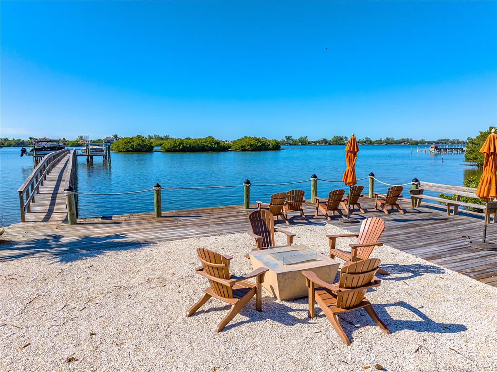 3929 Waypoint Avenue Osprey, FL 34229 - Photo 45 of 56 a view of a lake with outdoor seating space
