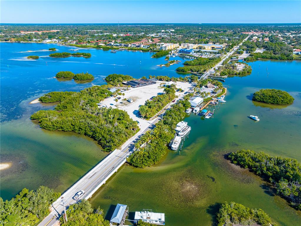 3929 Waypoint Avenue Osprey, FL 34229 - Photo 56 of 56 a view of a city with lawn chairs