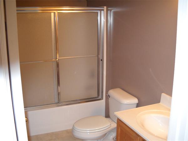 180 Popple Camp Road Petersham, MA 01366 - Photo 15 of 30 a white toilet sitting next to a bathroom sink