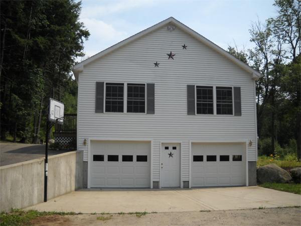 180 Popple Camp Road Petersham, MA 01366 - Photo 3 of 30 a front view of a house with a yard