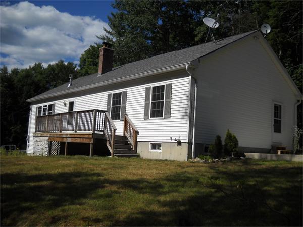 180 Popple Camp Road Petersham, MA 01366 - Photo 7 of 30 a backyard of a house with table and chairs