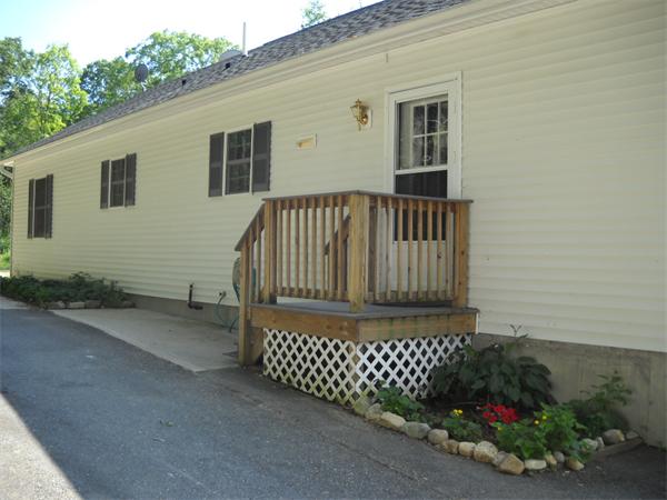 180 Popple Camp Road Petersham, MA 01366 - Photo 8 of 30 a view of a house with a small yard